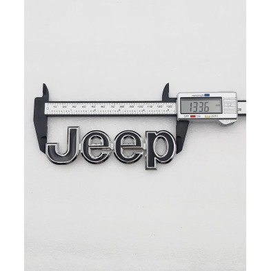 EMBLEMA DE PARRILLA JEEP NEGRO