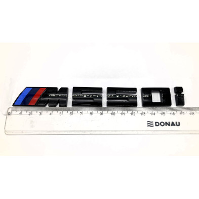 EMBLEMA TRASERO BMW M550i NEGRO BRILLO